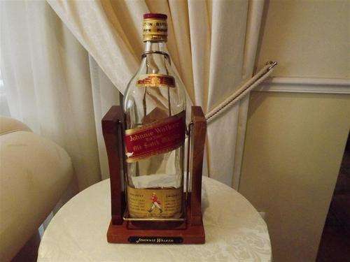 VINTAGE JOHNNIE WALKER  2 LITRE BOTTLE ON A WOOD SWING POURING STAND -STAMPED MADE IN ENGLAND -1974