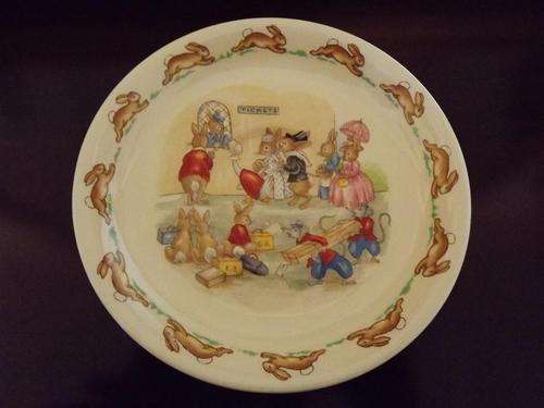 ROYAL DOULTON 'BUNNYKINS' SAUCER -"BUNNIES GOING TO THE TICKET OFFICE" 14 cm IN DIAMETER