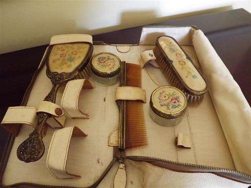 ANTIQUE LADIES BRUSH SET IN METAL WITH EMBROIDERY STILL IN ORIGINAL LEATHER HOLDER MADE IN ENGLAND