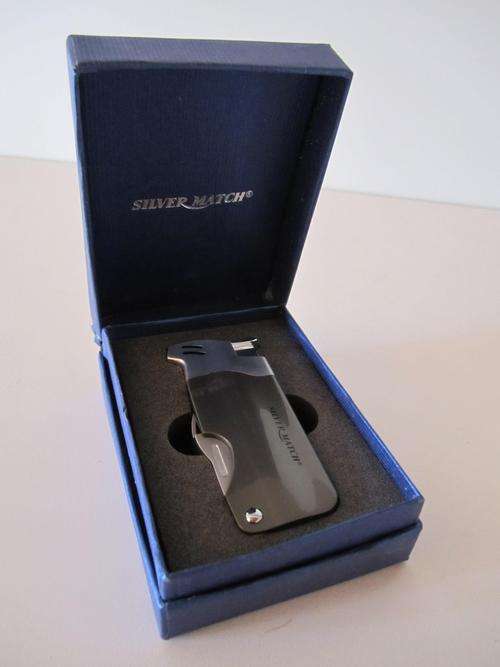 Originally Packaged Never been used stylish Silver Match Pipe Lighter!