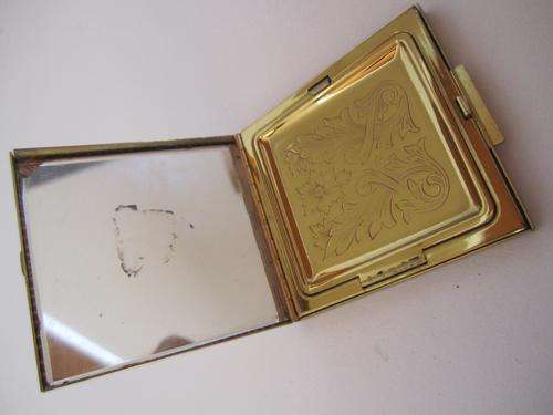 Absolutely Stunning Intricately designed Compact!