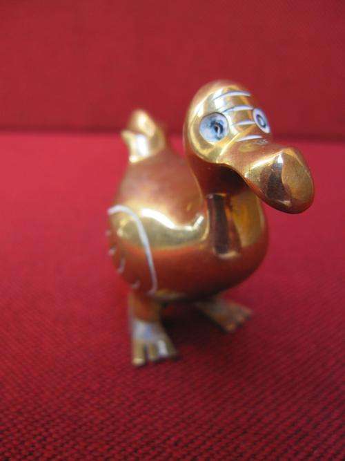 What a delightful little figurine! A small Solid and Sturdy Brass Dodo!