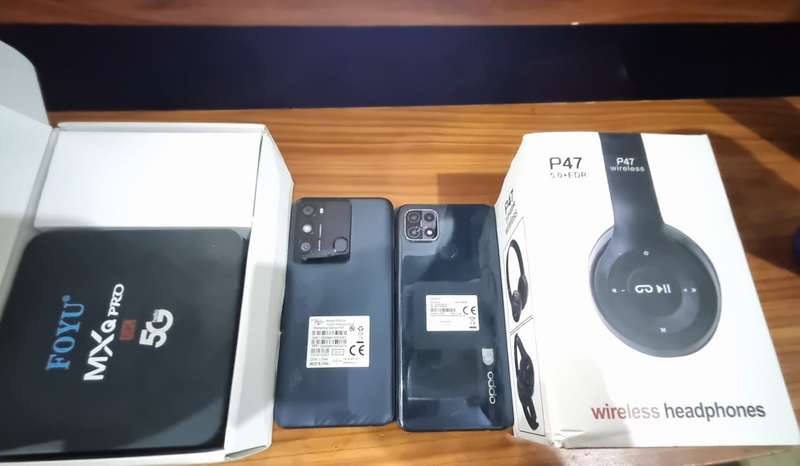 CELLPHONE BUNDLE DEAL  2 CELLPHONES + Android TV Box + Bluetooth  Headphones and Smartwatch