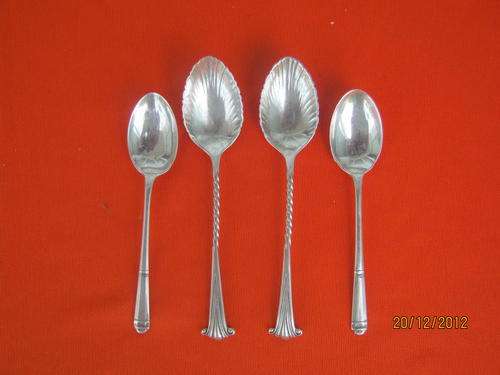 Two pairs of Ornate Hallmarked Silver Coffee Spoons