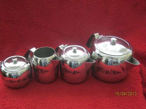 A Retro Stainless steel Teaset (4 Pieces)