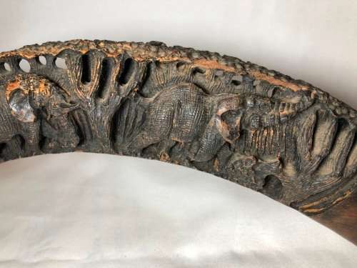 Unique wood carving of Elephants in a tusk shape - the perfect display piece