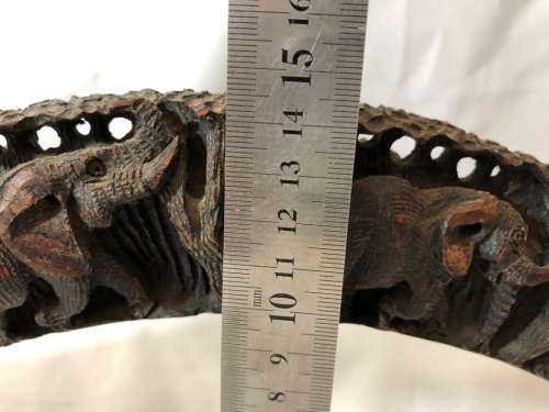 Unique wood carving of Elephants in a tusk shape - the perfect display piece