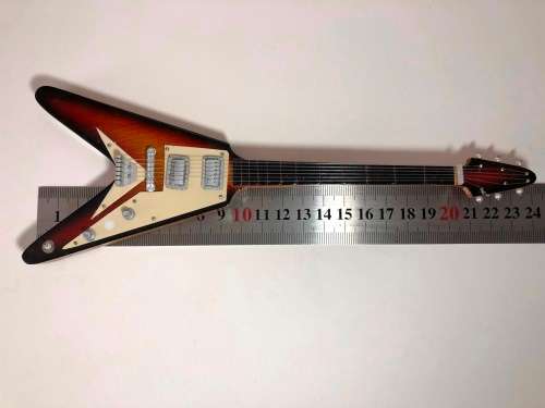 MINIATURE TOY REPLICA OF THE GIBSON FLYING V ELECTRICAL GUITAR