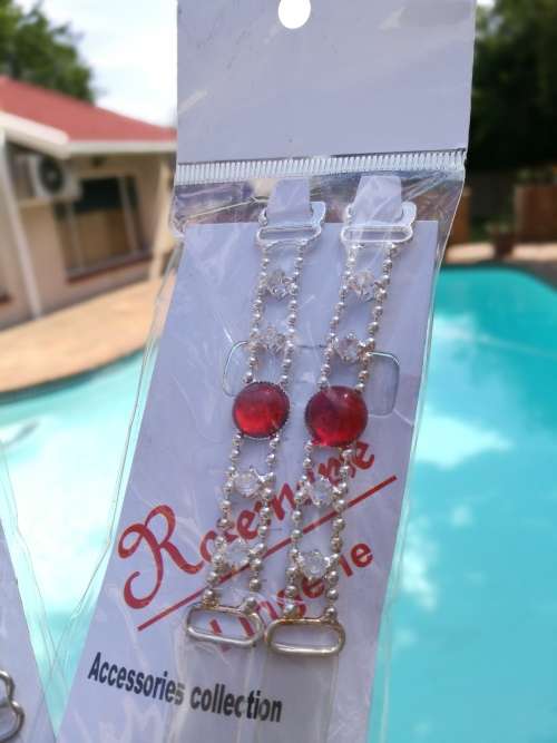 Shoulder strap with red stone for bra