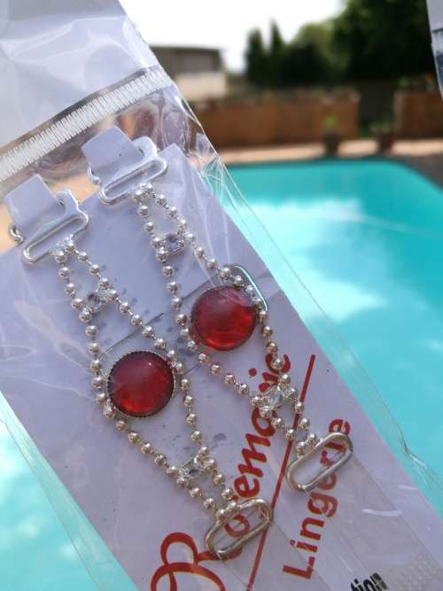 Shoulder strap with red stone for bra