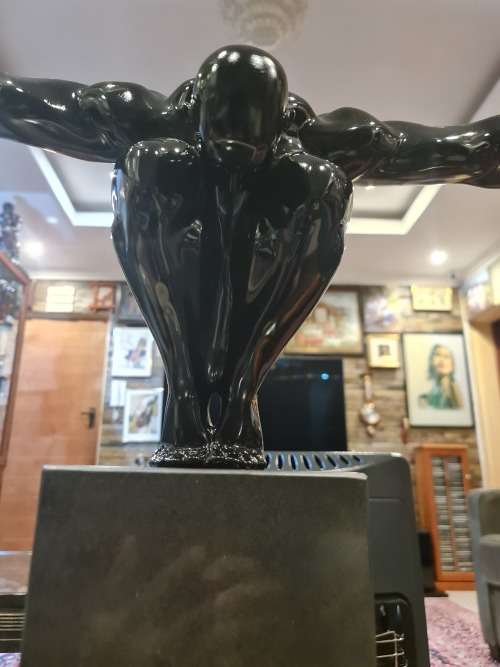 Crouching Man Resin Sculpture on Granite Stand