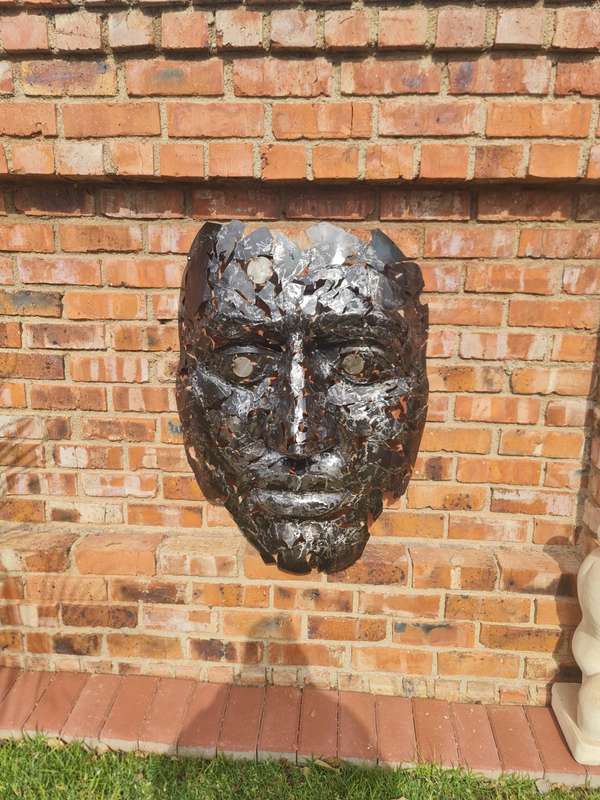 Silver Man Face Metal Sculpture