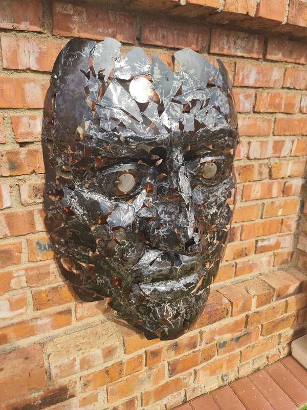 Silver Man Face Metal Sculpture