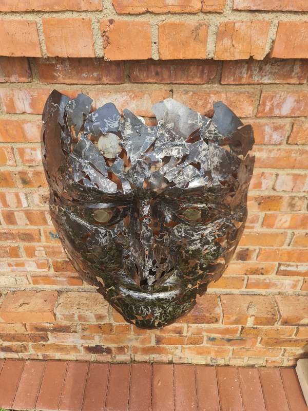 Silver Man Face Metal Sculpture