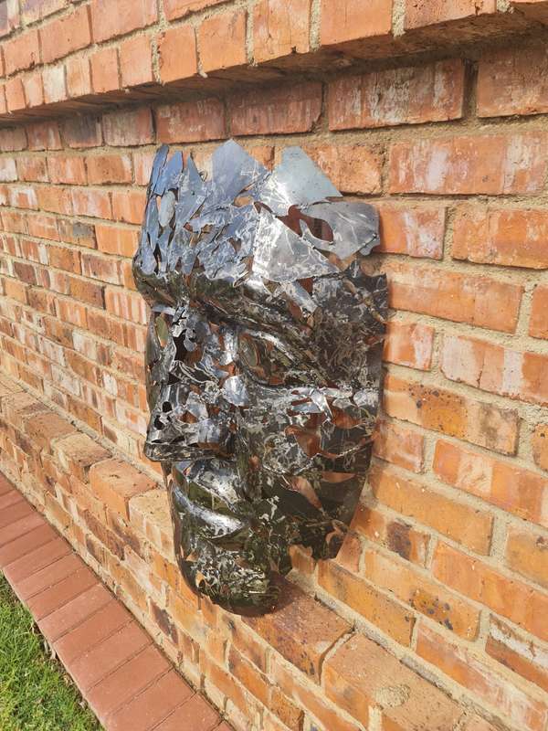 Silver Man Face Metal Sculpture