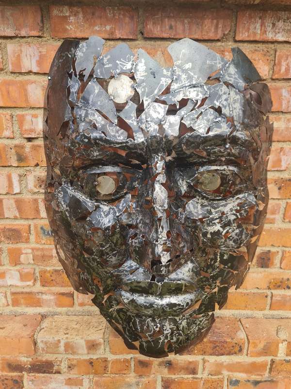 Silver Man Face Metal Sculpture
