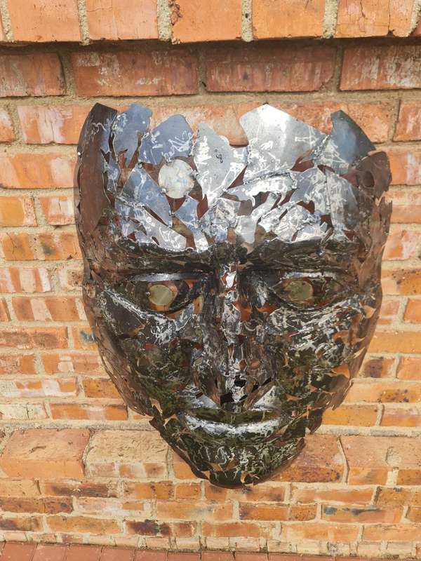 Silver Man Face Metal Sculpture
