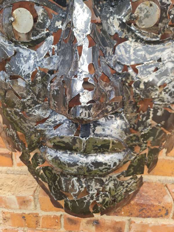 Silver Man Face Metal Sculpture