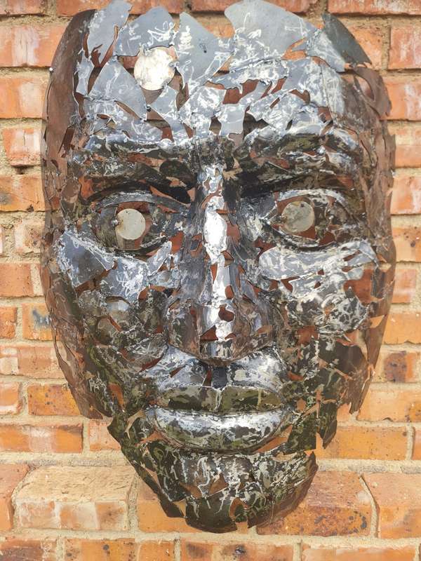 Silver Man Face Metal Sculpture
