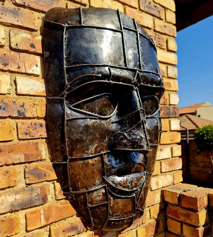 Large Heavy Solid Metal Face Sculpture