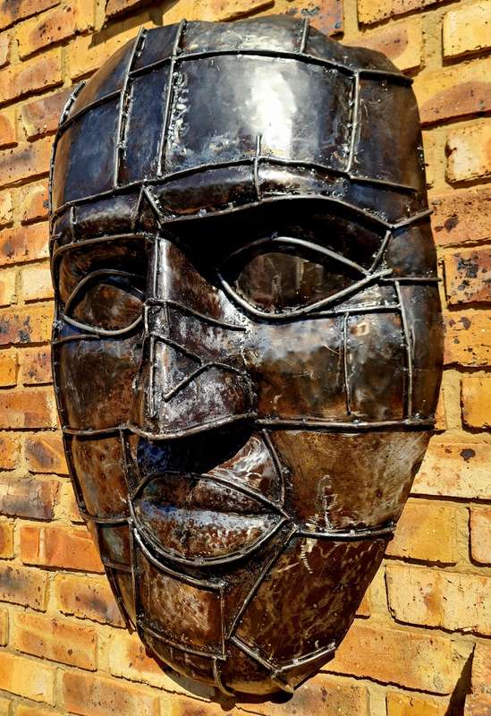 Large Heavy Solid Metal Face Sculpture