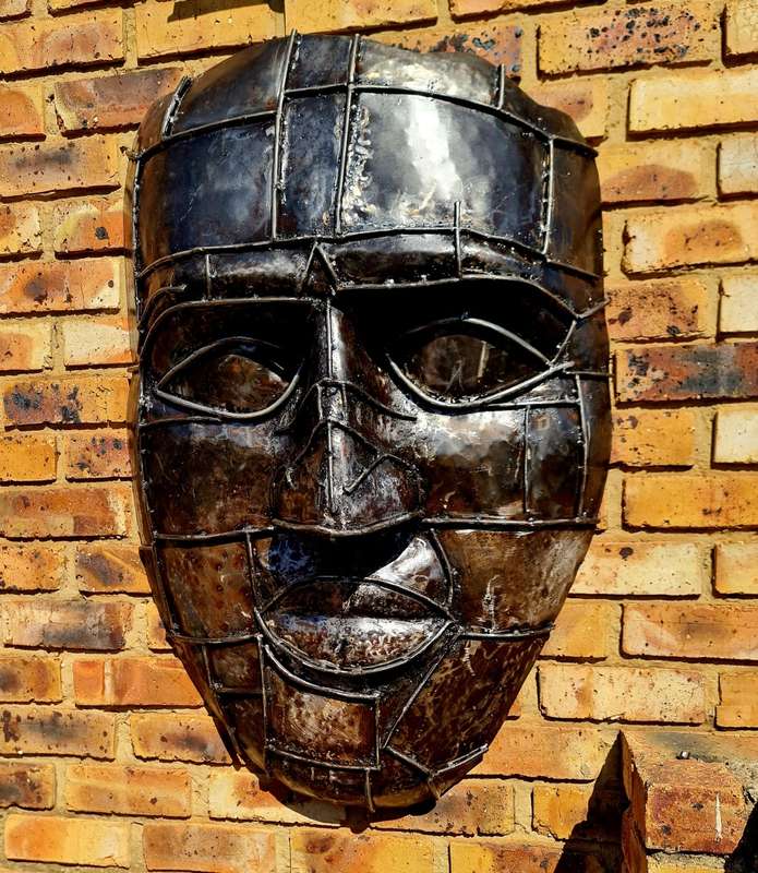 Large Heavy Solid Metal Face Sculpture