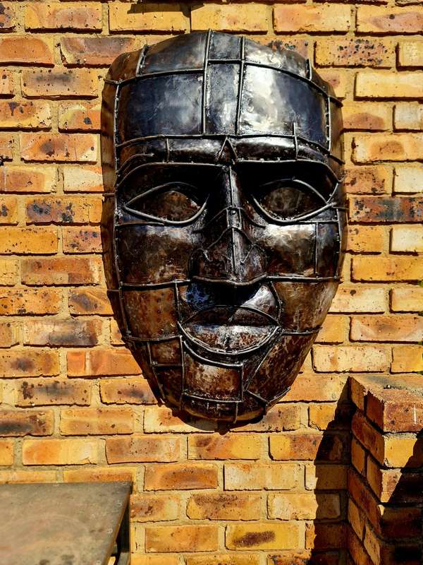 Large Heavy Solid Metal Face Sculpture