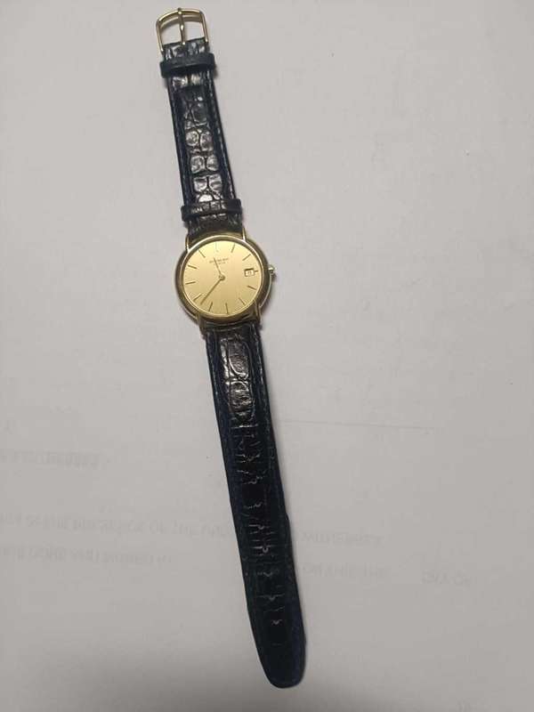 Raymond Weil Gold Dial Date Black Strap Watch