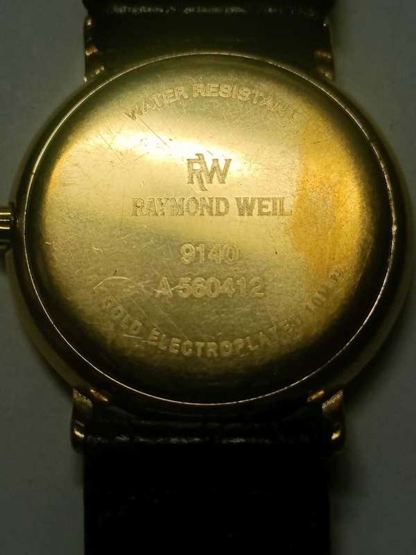 Raymond Weil Gold Dial Date Black Strap Watch