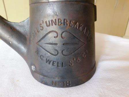 A.C. WELLS & CO UNBREAKABLE STRENGTH & DURABILITY NO 18 CAST IRON OIL/FLARE LAMP