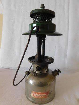 COLEMAN 249 - 299 LAMP MARKED 64 AT BOTTOM