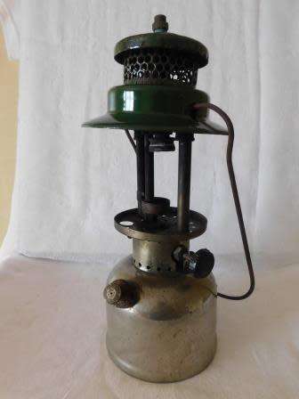COLEMAN 249 - 299 LAMP MARKED 64 AT BOTTOM