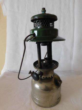 COLEMAN 249 - 299 LAMP MARKED 64 AT BOTTOM