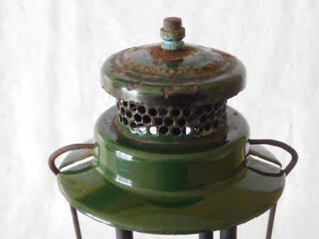 COLEMAN 249 - 299 LAMP MARKED 64 AT BOTTOM