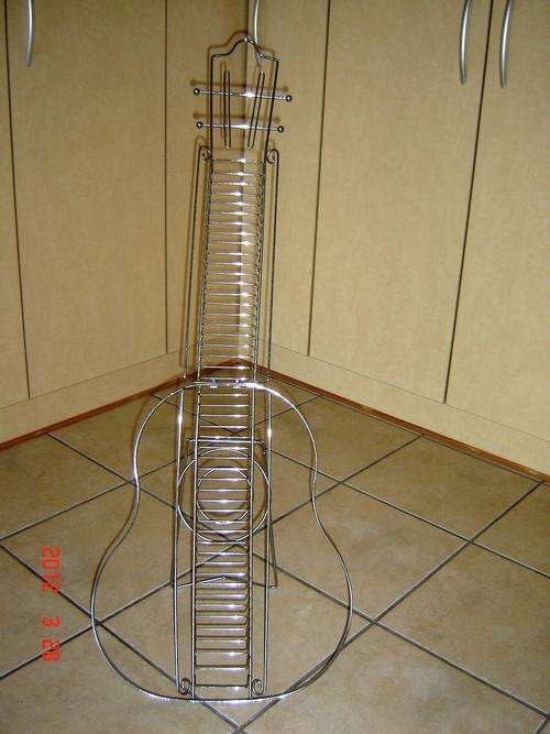 UNIQUE CD HOLDER IN THE SHAPE OF A GUITAR