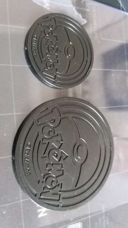 official pokemon collectors coin- Charizard Large
