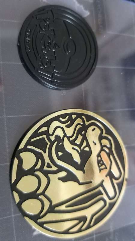 official pokemon collectors coin- Charizard Large