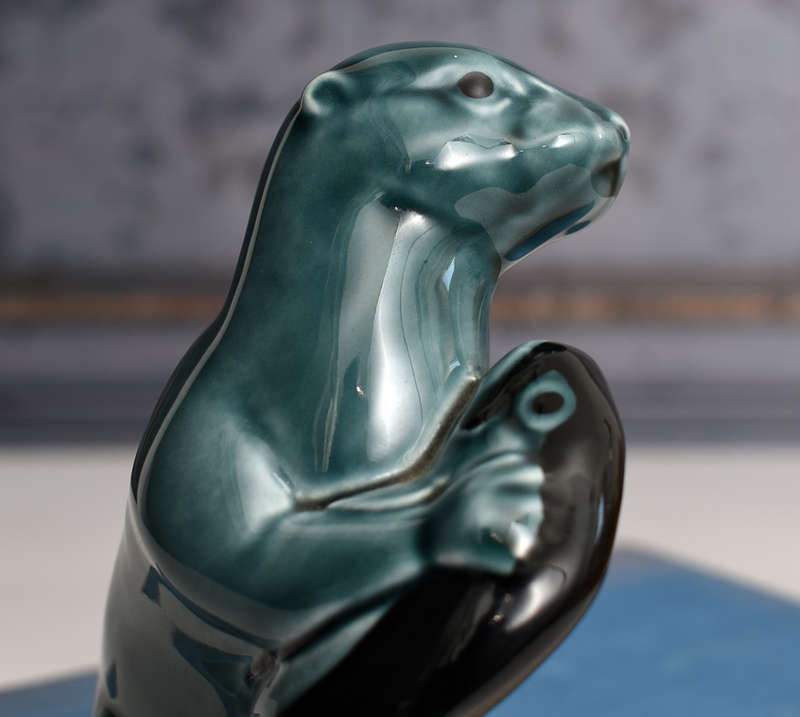Vintage Poole Pottery otter holding Fish