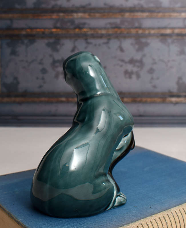 Vintage Poole Pottery otter holding Fish