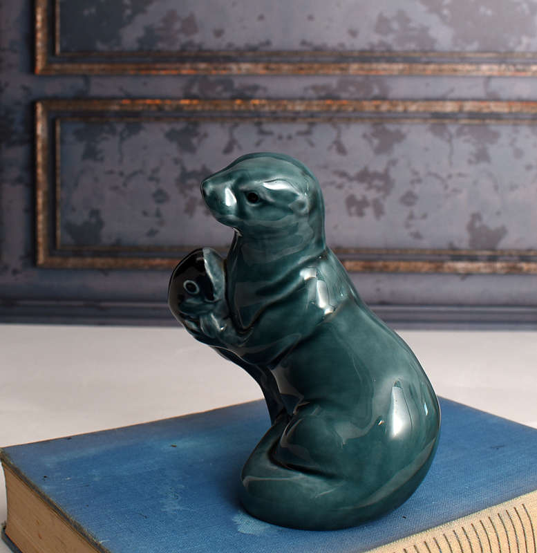 Vintage Poole Pottery otter holding Fish