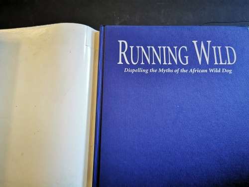 Running Wild: Dispelling the Myths of the African Wild Dog by John Mc Nutt and Lesley Boggs