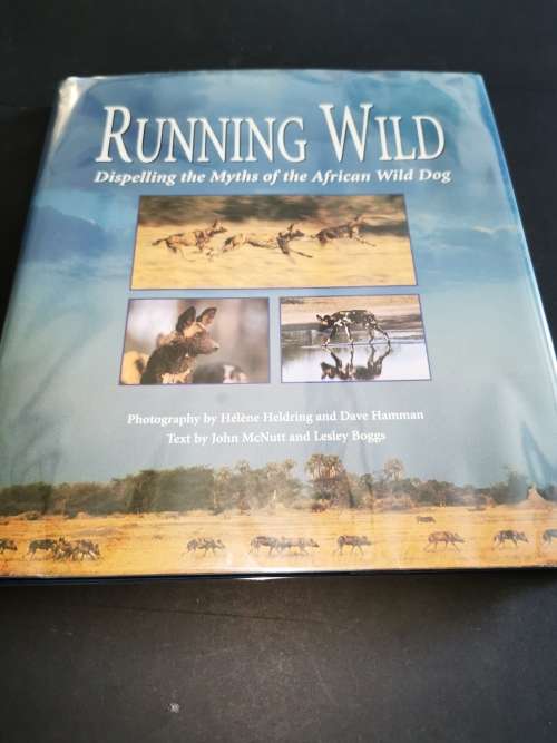Running Wild: Dispelling the Myths of the African Wild Dog by John Mc Nutt and Lesley Boggs