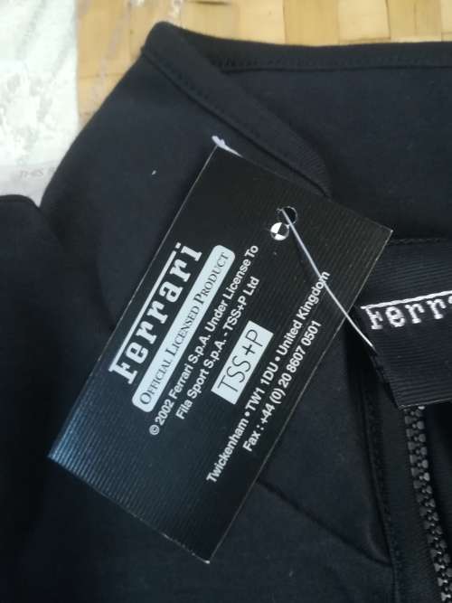 Ferrari long sleeve ladies` jacket. Official Licensed. Made in United Kingdom. Brand New. Size XXS.