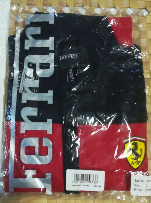 Ferrari long sleeve ladies` jacket. Official Licensed. Made in United Kingdom. Brand New. Size XXS.