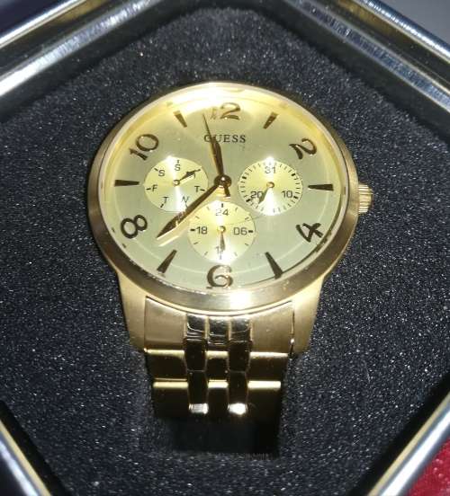 Guess Watch. Goldtone Stainless Steel .