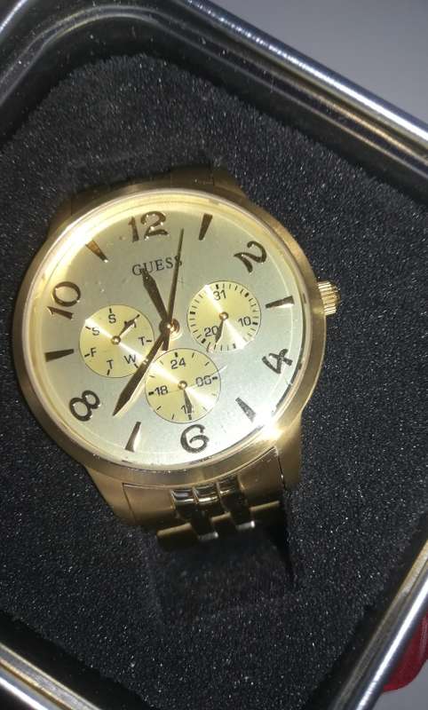 Guess Watch. Goldtone Stainless Steel .