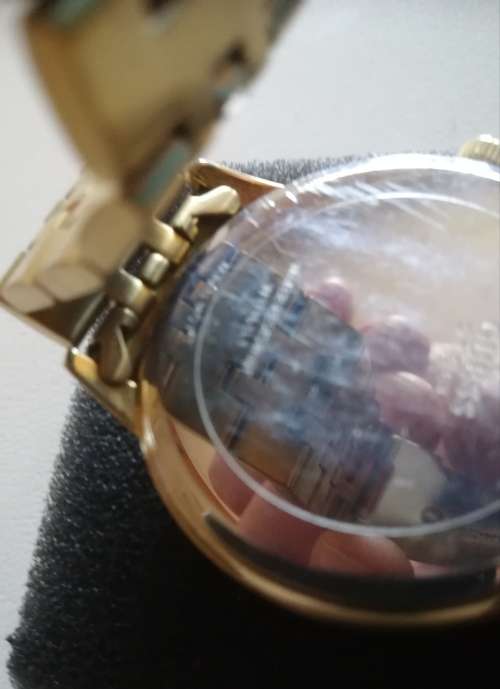 Guess Watch. Goldtone Stainless Steel .