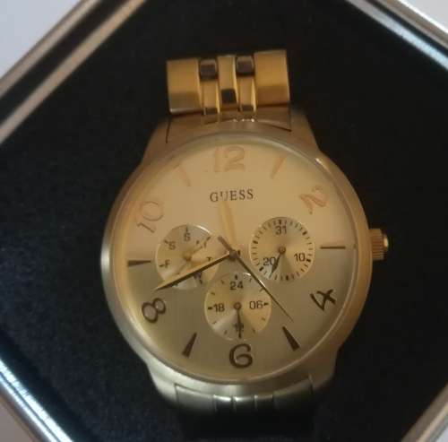 Guess Watch. Goldtone Stainless Steel .