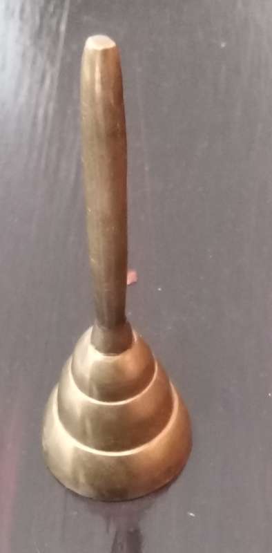 Brass bell. Height 8cm. Diameter bottom 3cm.
