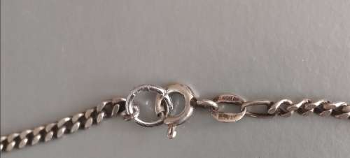 Sterling silver necklace (925) with Stainless steel Cross Pendant. Lenght of necklace 57cm. 12.25g
